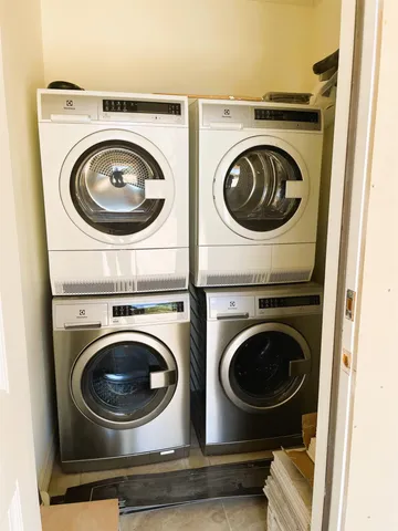 a view of living room with washer and dryer