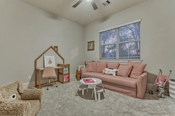 a bathroom with a sink double vanity granite tub and a mirror