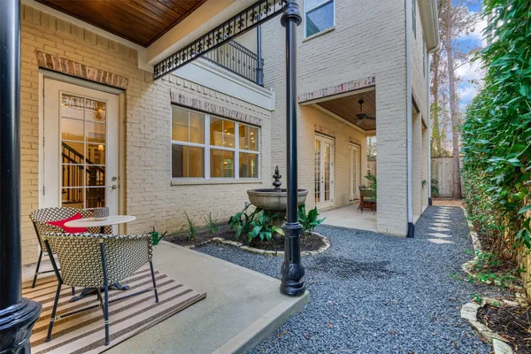 a view of an chairs and tables in the patio