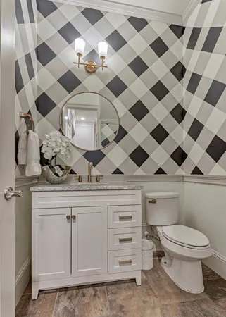 a view of a livingroom with furniture and windows