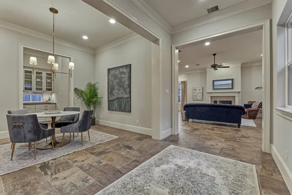 a kitchen with cabinets and window