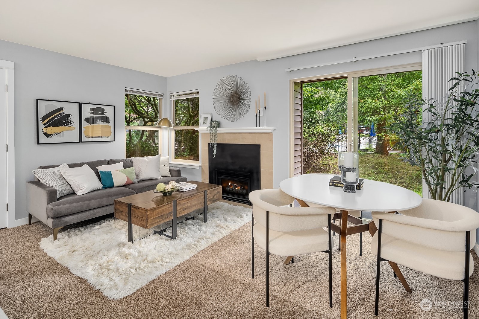 9805 Avondale Road Northeast, Unit R149 Redmond, WA 98052 - Photo 3 of 21 a living room with furniture and a fireplace