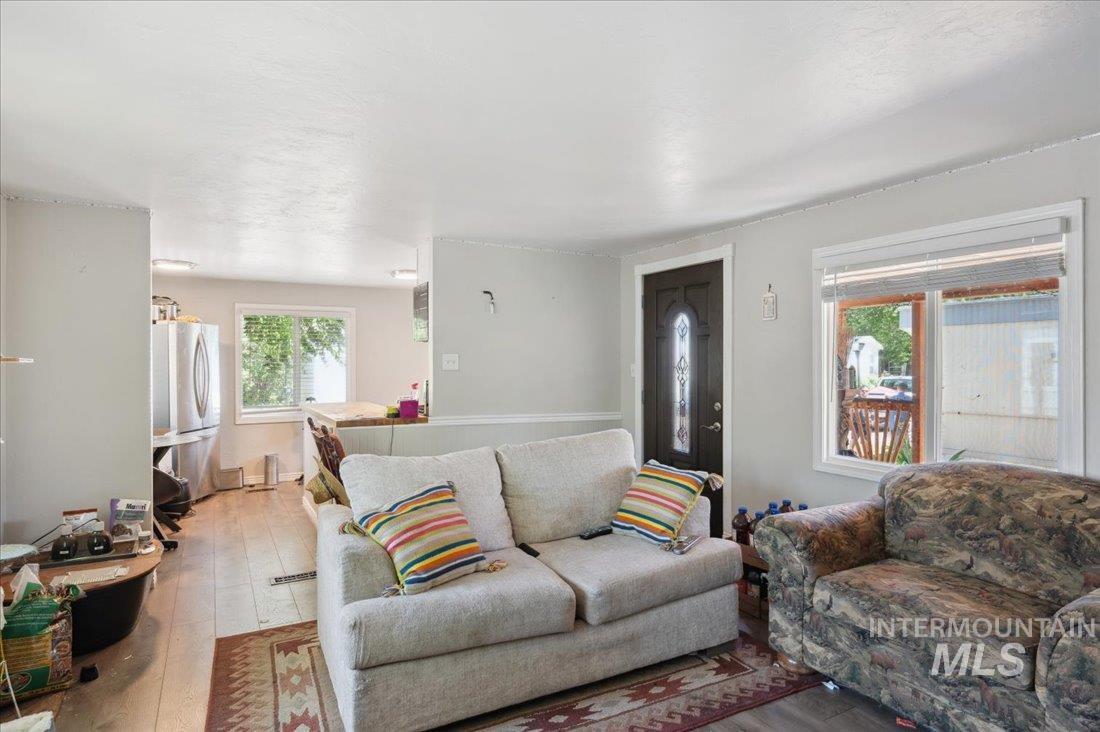 790 North Riviera Drive Boise, ID 83703 - Photo 6 of 15 Living area featuring wood-type flooring