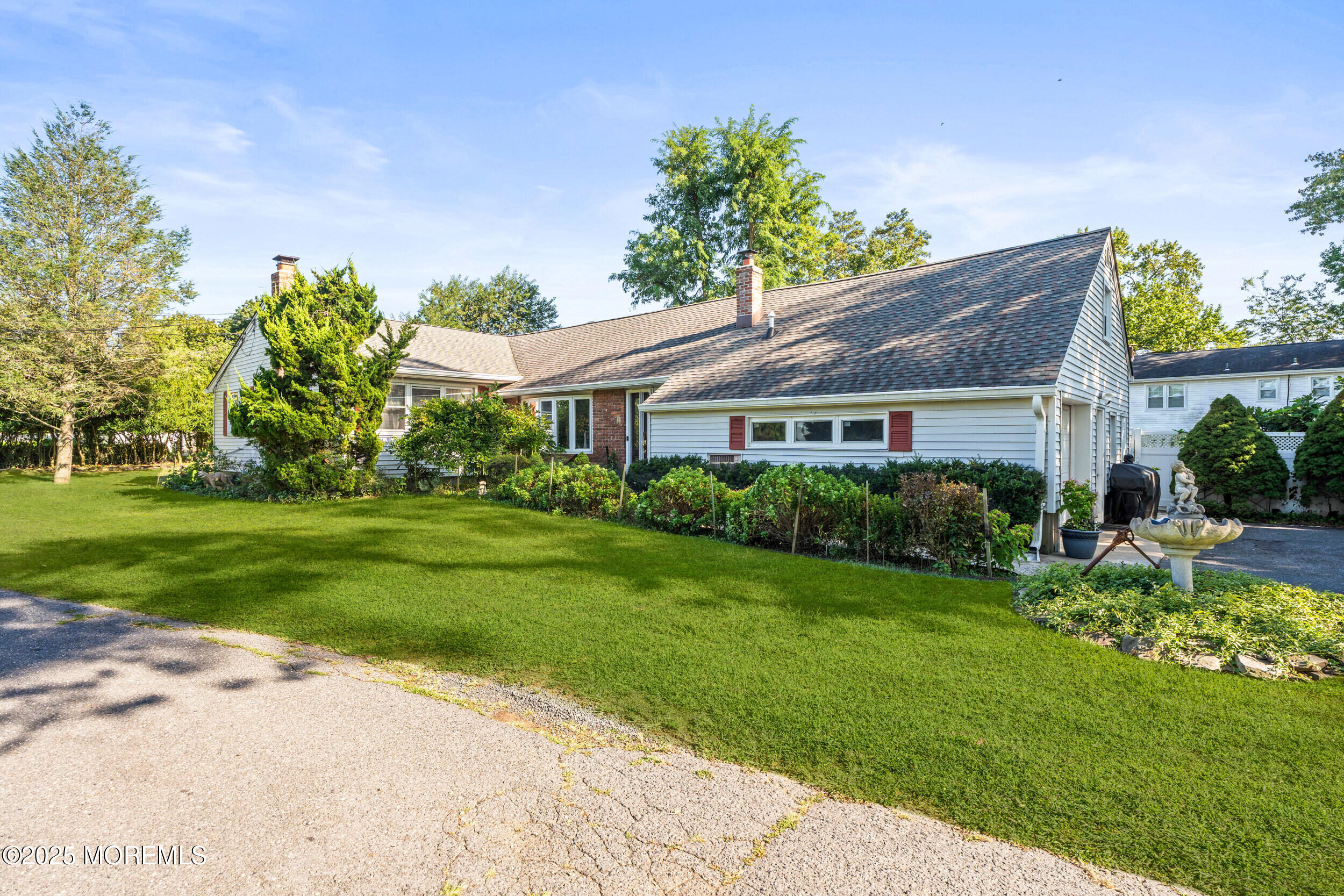 514 Deal Road Asbury Park, NJ 07712 - Photo 2 of 36 a front view of house with yard and green space