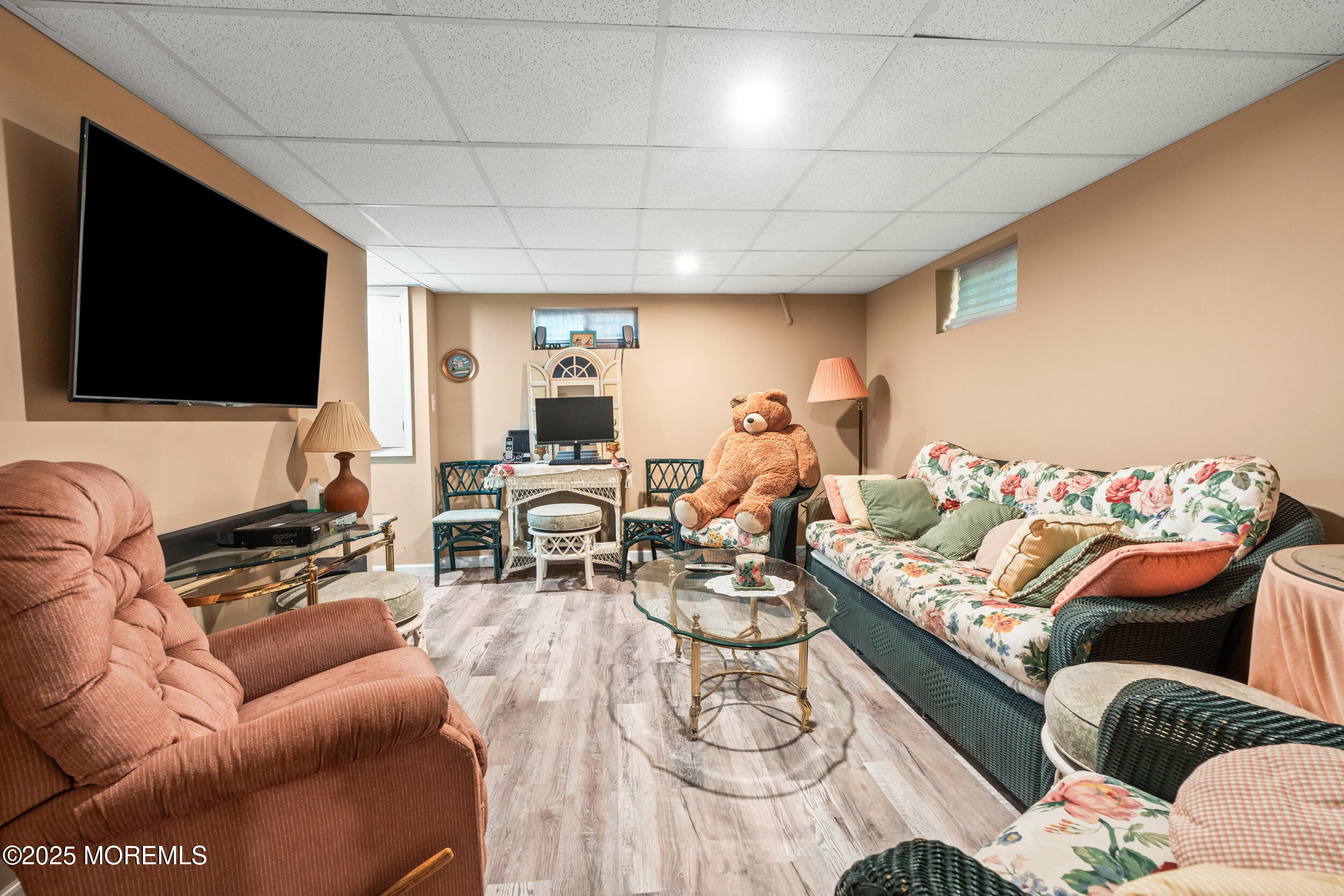 514 Deal Road Asbury Park, NJ 07712 - Photo 22 of 36 a living room with furniture and a flat screen tv