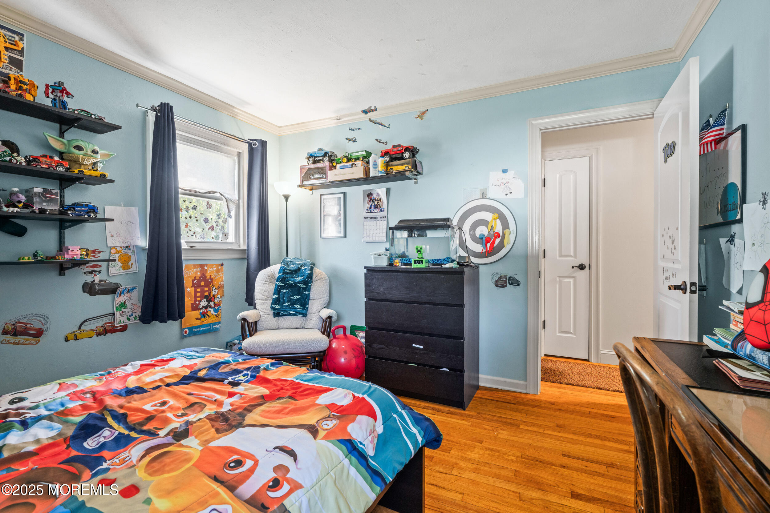 514 Deal Road Asbury Park, NJ 07712 - Photo 23 of 36 a bedroom with a bed and a tv in it