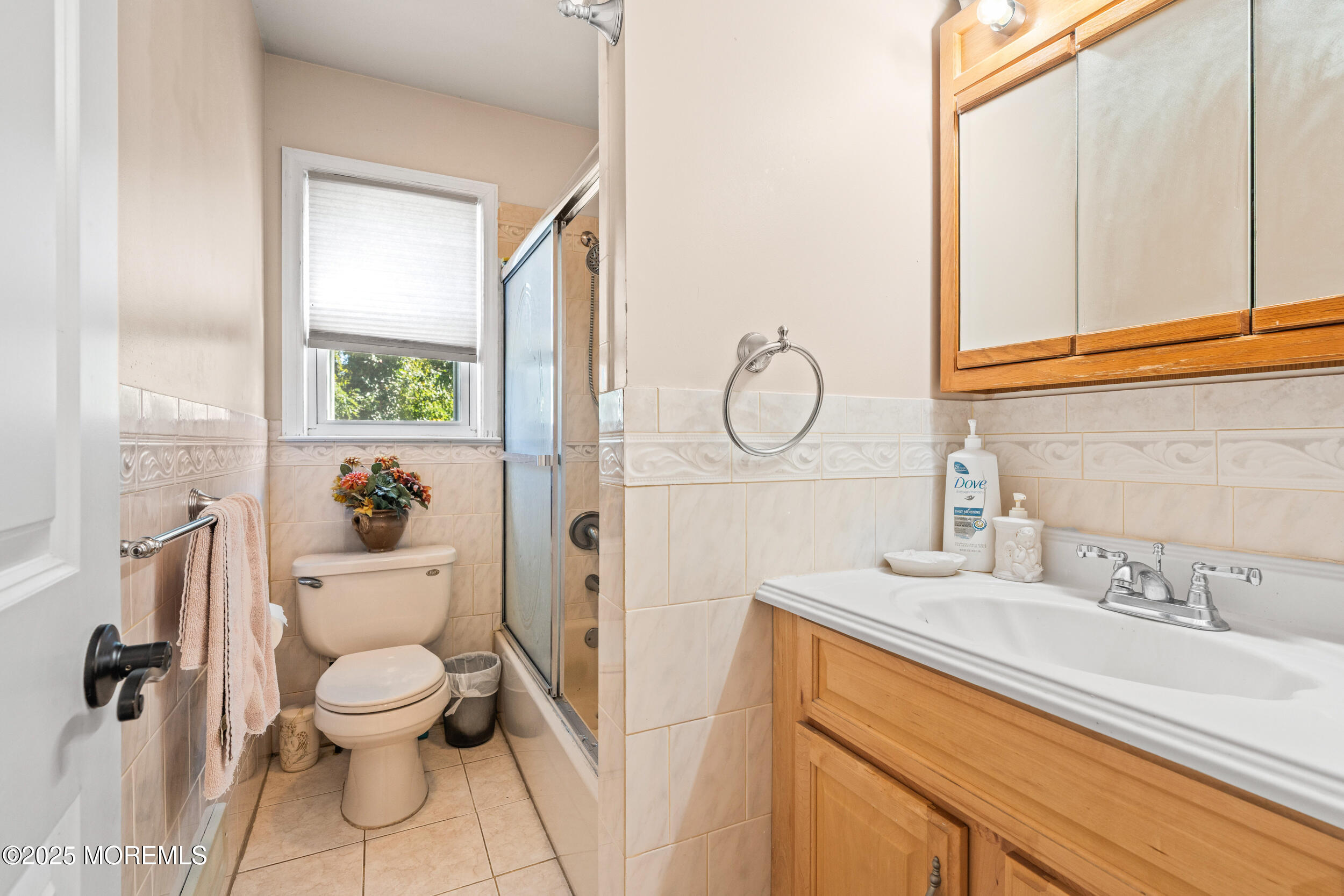 514 Deal Road Asbury Park, NJ 07712 - Photo 24 of 36 a bathroom with a sink a toilet and a mirror