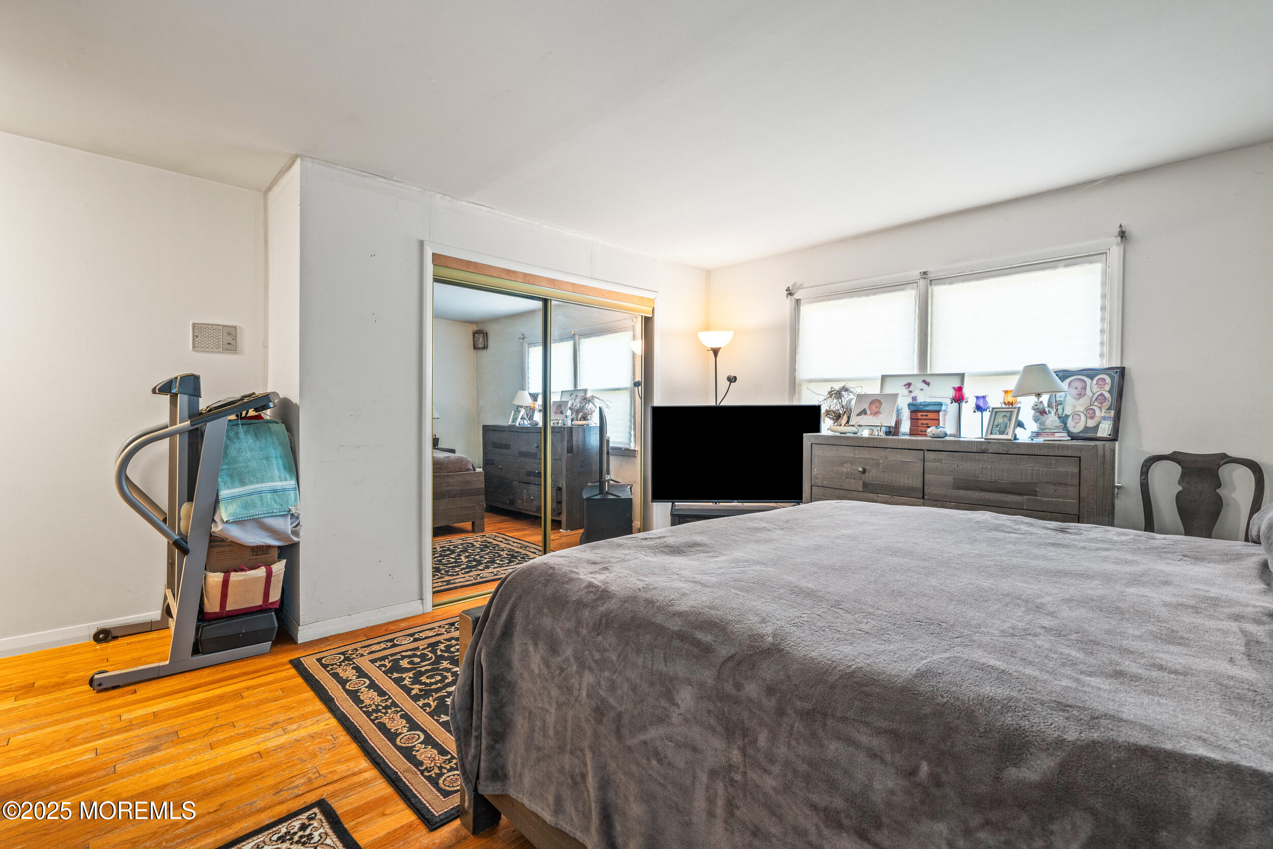 514 Deal Road Asbury Park, NJ 07712 - Photo 27 of 36 a bed room with a bed and dresser