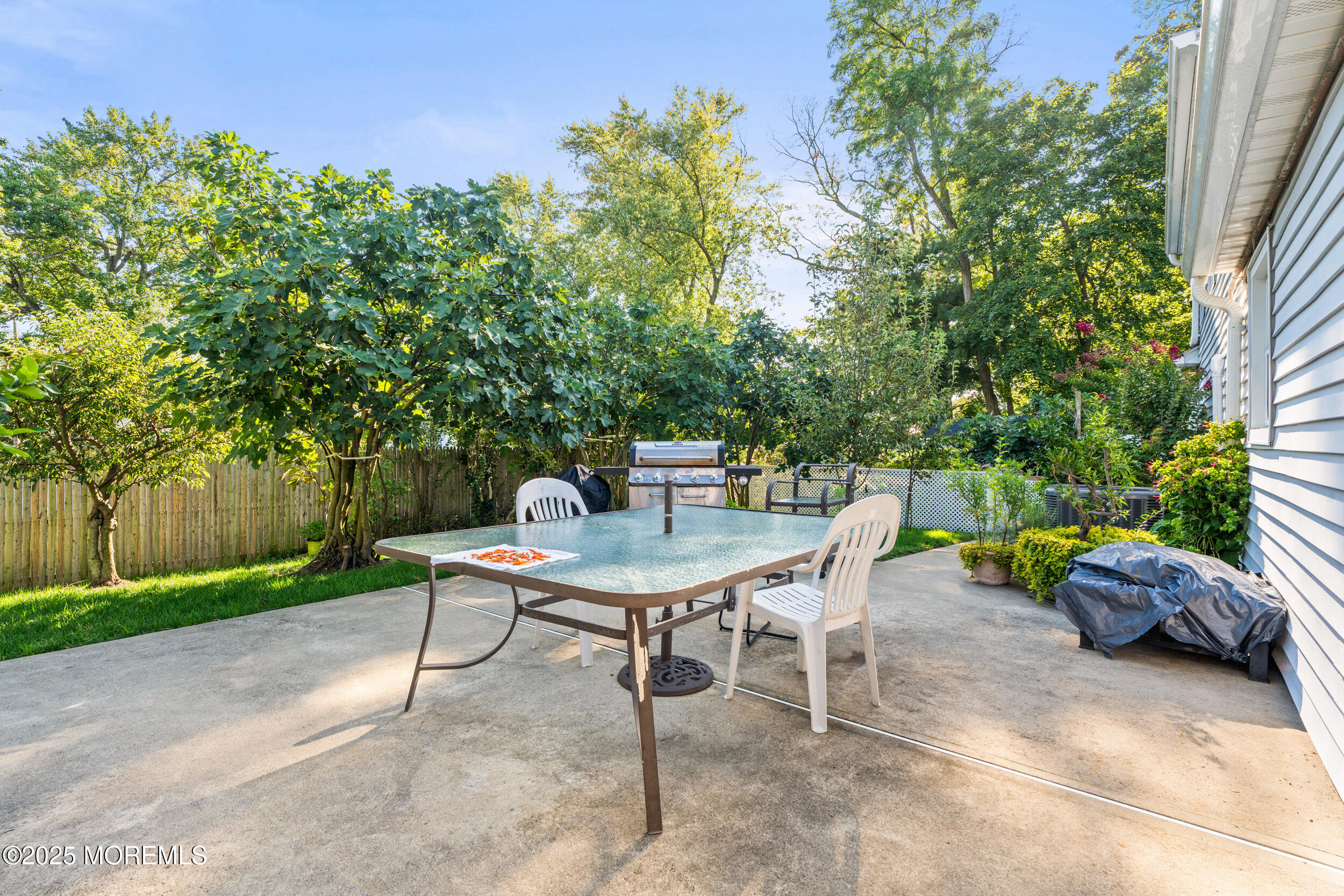 514 Deal Road Asbury Park, NJ 07712 - Photo 31 of 36 a view of a table and chairs in patio
