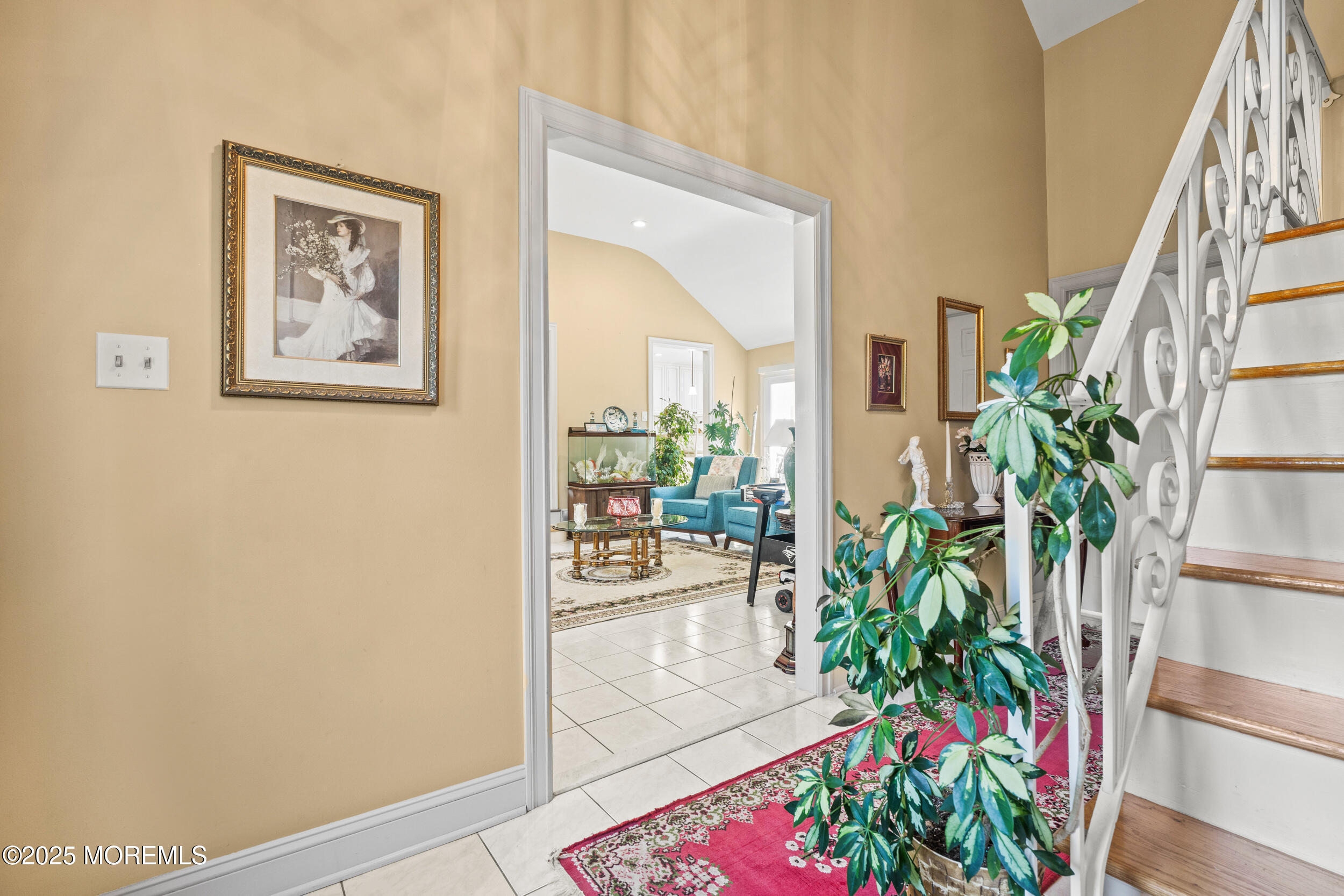 514 Deal Road Asbury Park, NJ 07712 - Photo 6 of 36 a view of a hallway with wooden floor and a flower pot