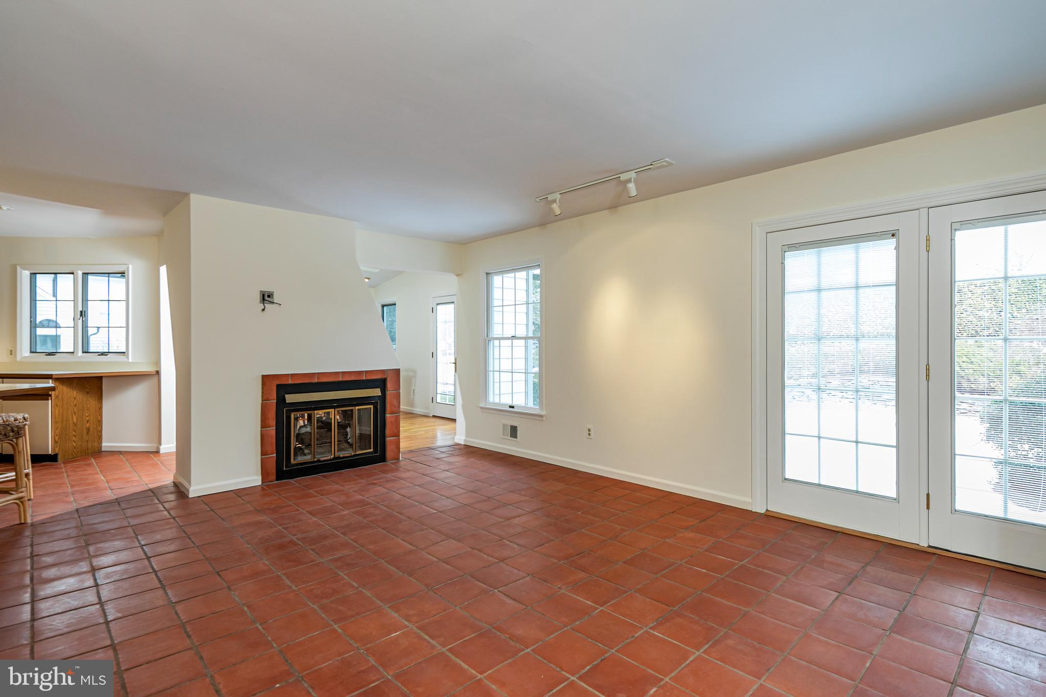 30 Baldwin Street Pennington, NJ 08534 - Photo 11 of 37 an empty room with windows fireplace and windows