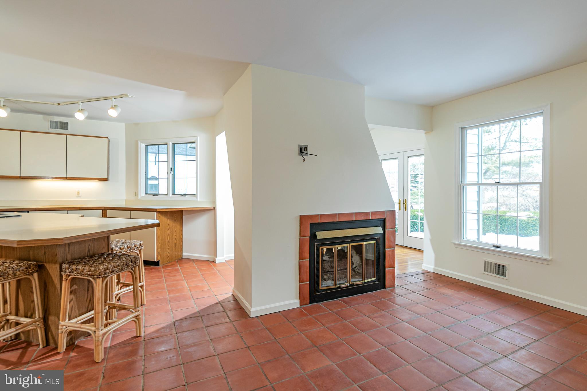 30 Baldwin Street Pennington, NJ 08534 - Photo 12 of 37 a view of an empty room with a fireplace and a window