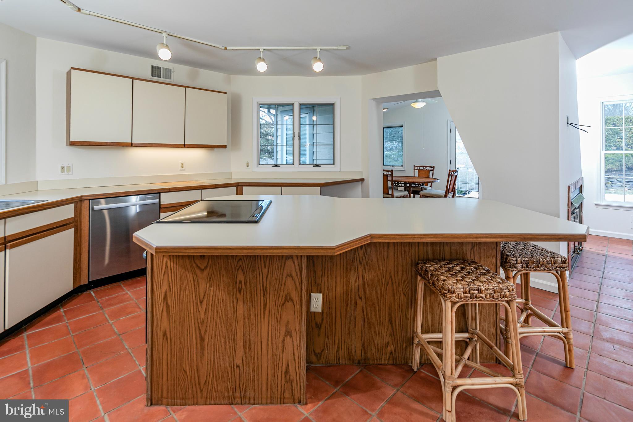 30 Baldwin Street Pennington, NJ 08534 - Photo 16 of 34 a kitchen with a sink and cabinets