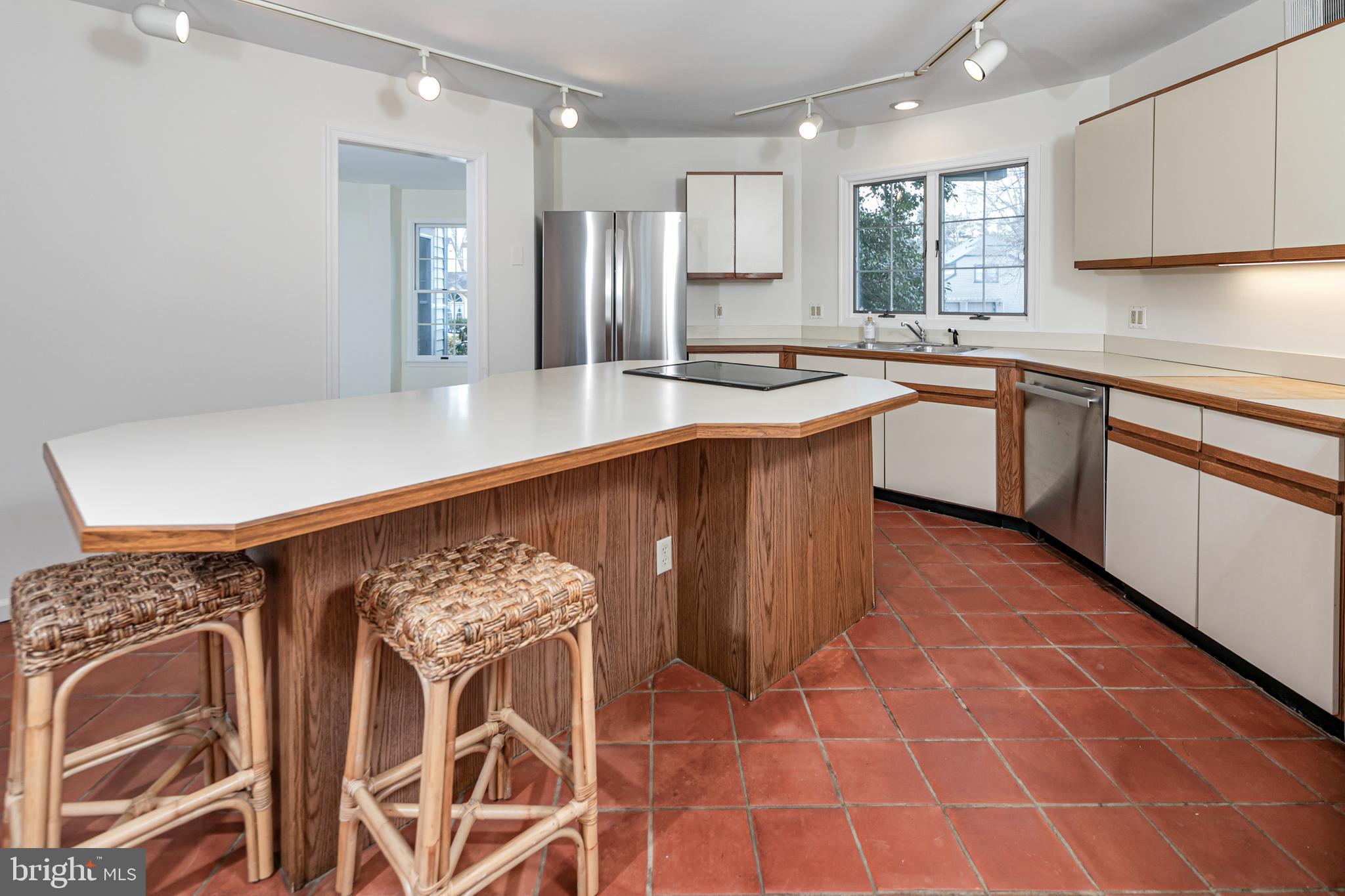 30 Baldwin Street Pennington, NJ 08534 - Photo 17 of 34 a kitchen with stainless steel appliances a sink stove and cabinets