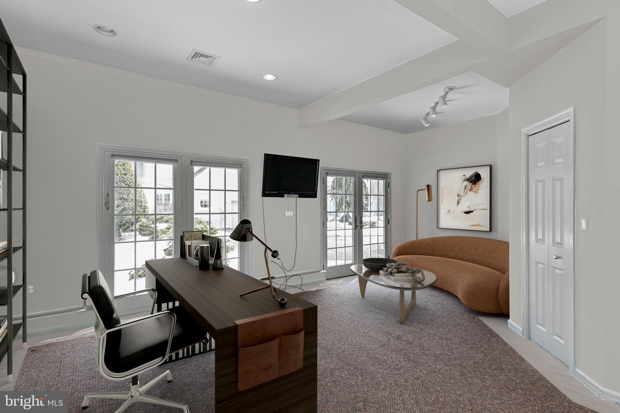 30 Baldwin Street Pennington, NJ 08534 - Photo 19 of 34 a living room with furniture and a flat screen tv