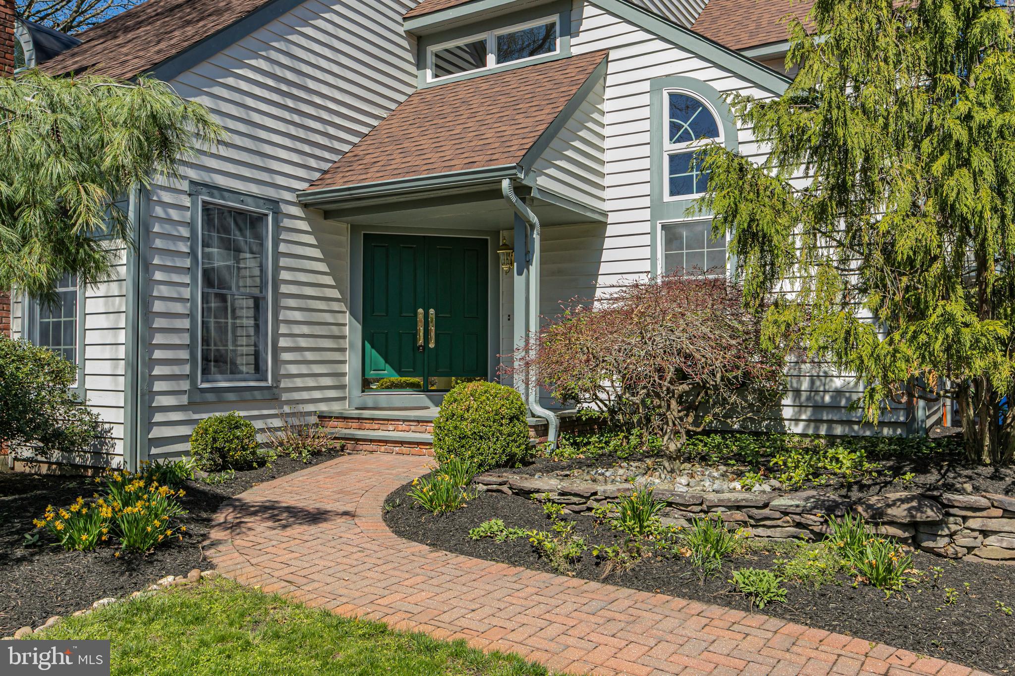 30 Baldwin Street Pennington, NJ 08534 - Photo 2 of 37 a front view of a house with garden