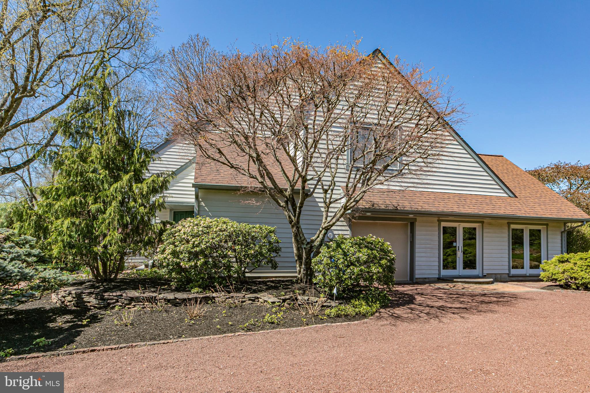 30 Baldwin Street Pennington, NJ 08534 - Photo 33 of 37 front view of a house with a garden