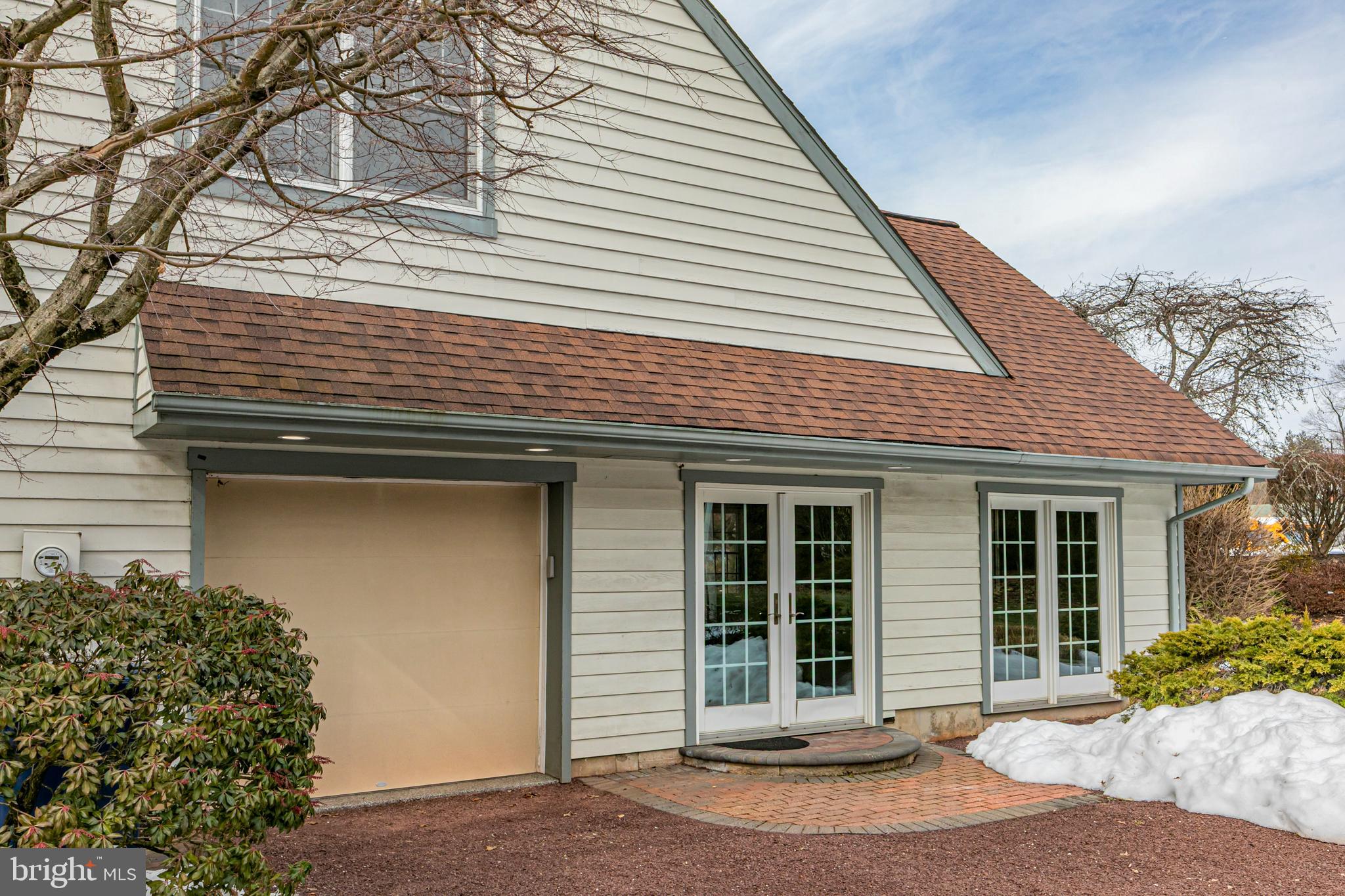 30 Baldwin Street Pennington, NJ 08534 - Photo 34 of 34 a front view of a house with a garden and yard