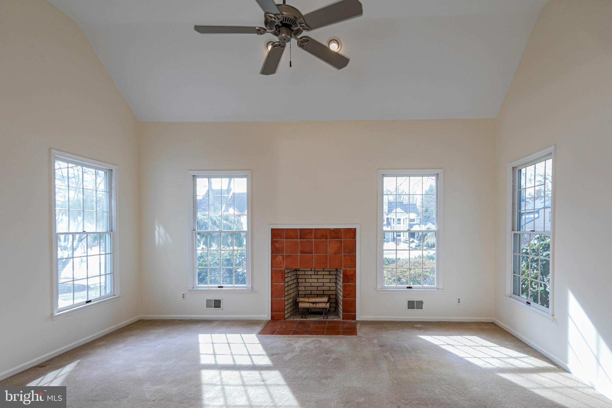 30 Baldwin Street Pennington, NJ 08534 - Photo 8 of 34 a view of an empty room with a window and fire place