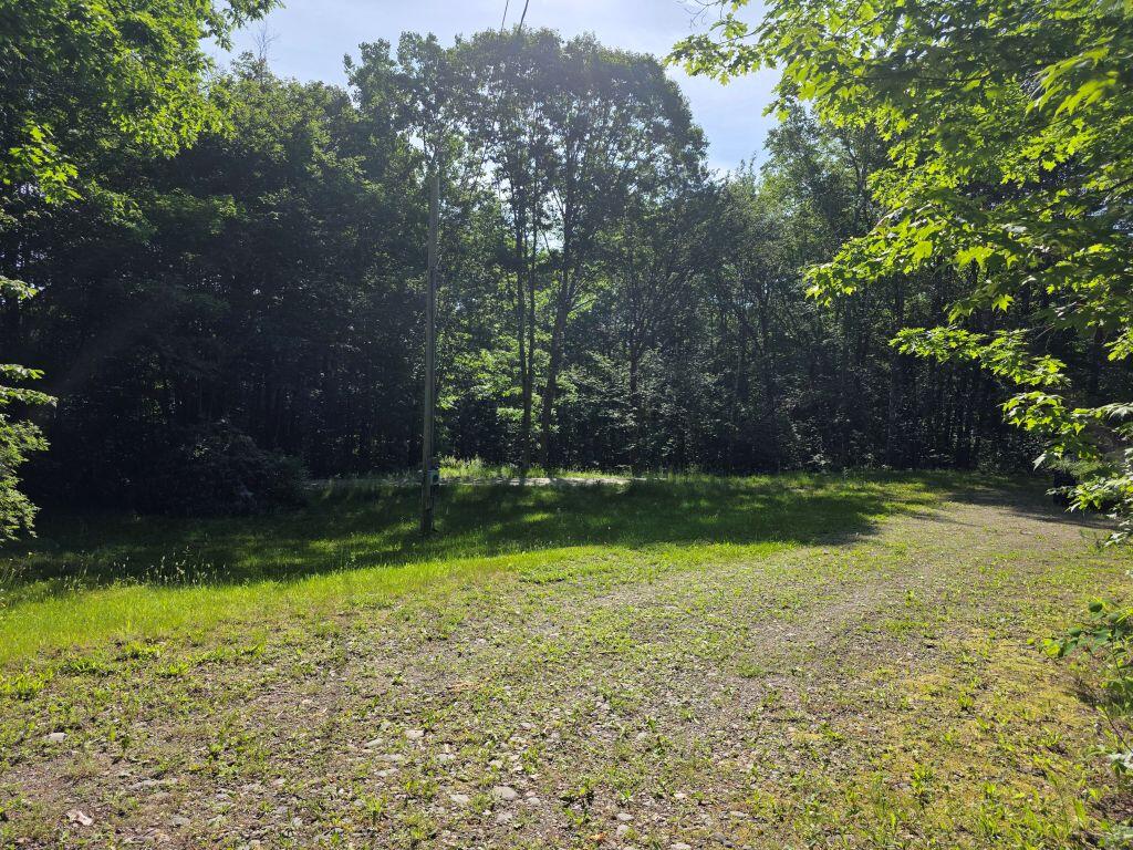 127 Hanscom Road Benton, ME 04901 - Photo 2 of 9 Land from road