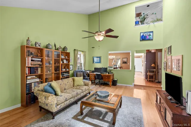 a view of a dining room with furniture and window