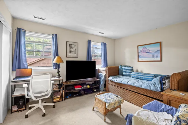 a bath room with a bath tub and a shower