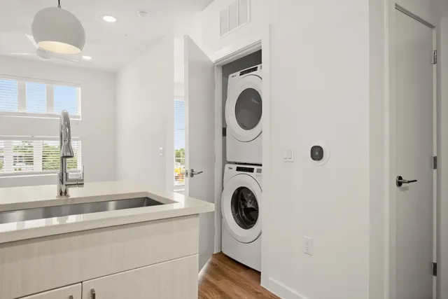 a utility room with dryer and washer