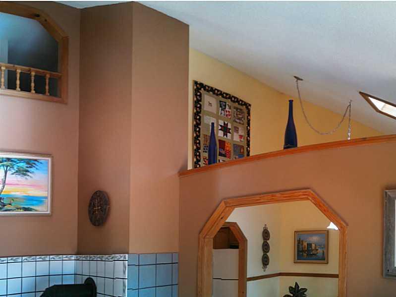 295 White Point Estates Road Lincoln, ME 04457 - Photo 17 of 30 Living Room. Vaulted ceilings lend a...