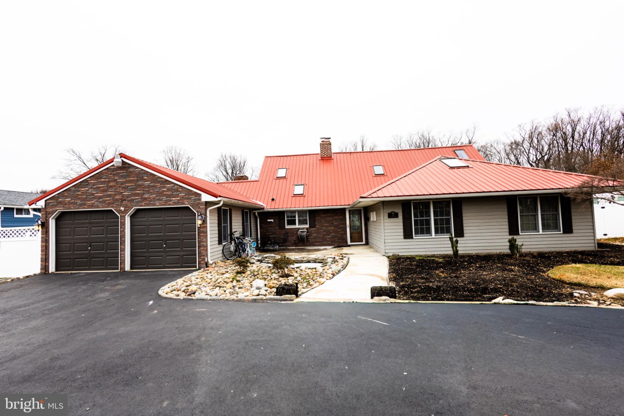 24 Rose Apple Road Levittown, PA 19056 - Photo 3 of 24 a front view of a house with a yard