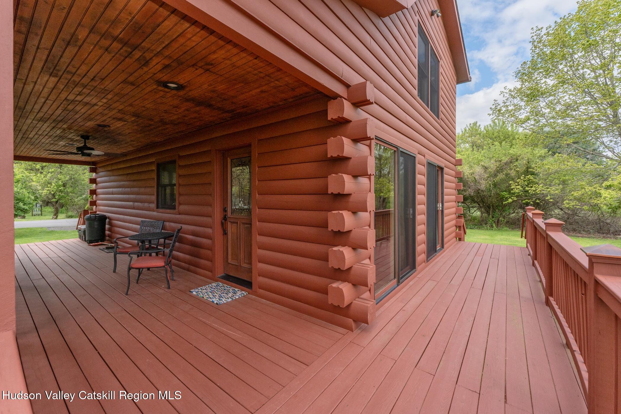 140 Stone Dock Road High Falls, NY 12440 - Photo 34 of 42 a view of balcony with wooden floor and outdoor seating