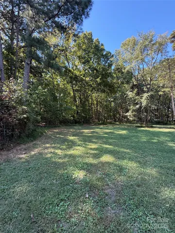 a view of outdoor space yard and swimming pool