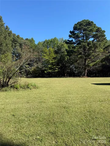 a view of outdoor space and yard
