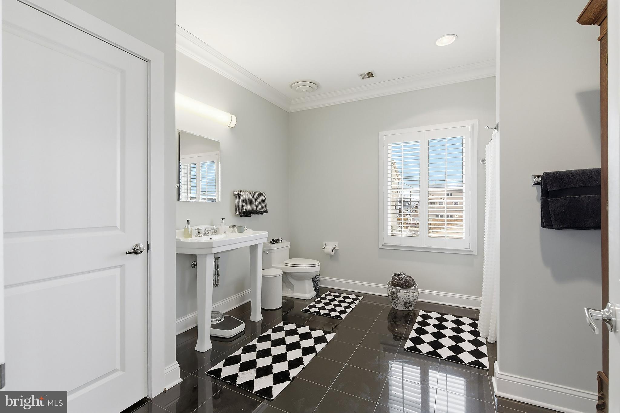 33 Sands Point Road Waretown, NJ 08758 - Photo 39 of 79 Sleek modern bathroom with chic accents.