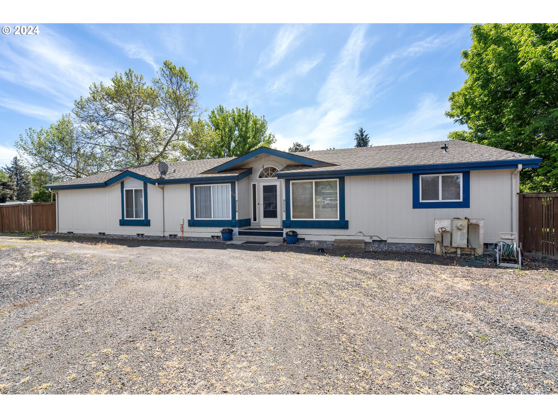 844 6th Street Athena, OR 97813 - Photo 27 of 36 a front view of a house with a yard and garage