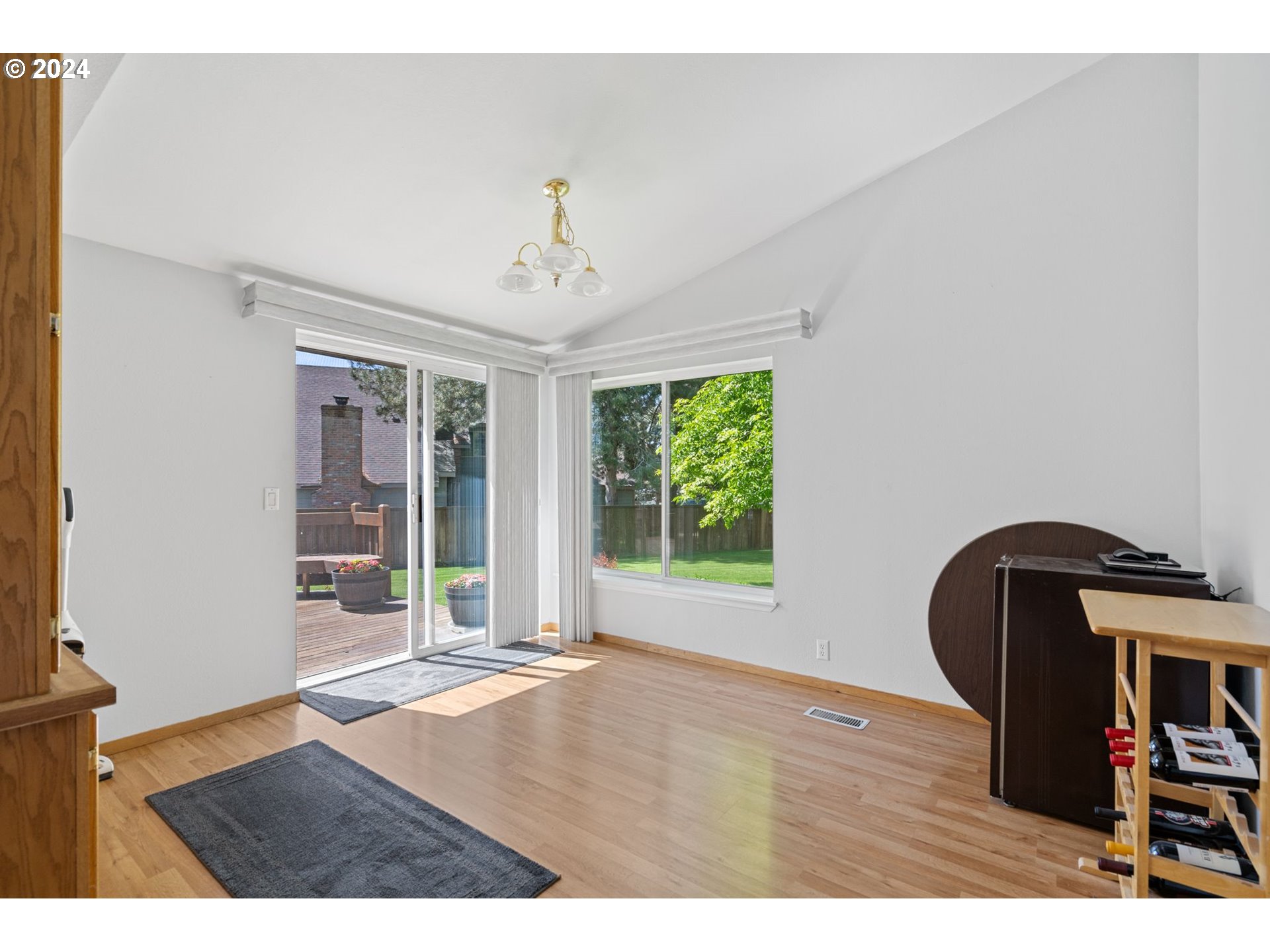 844 6th Street Athena, OR 97813 - Photo 6 of 36 a view of an empty room with wooden floor and a window