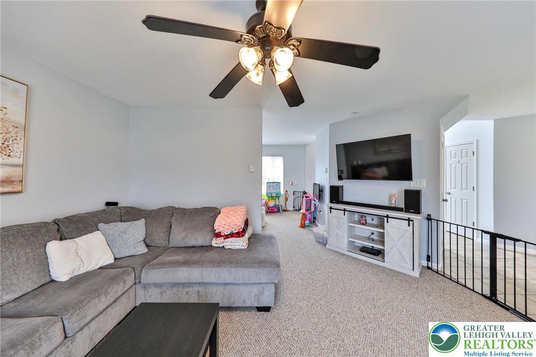 2260 Reo Drive Effort, PA 18330 - Photo 11 of 40 a living room with furniture and a flat screen tv