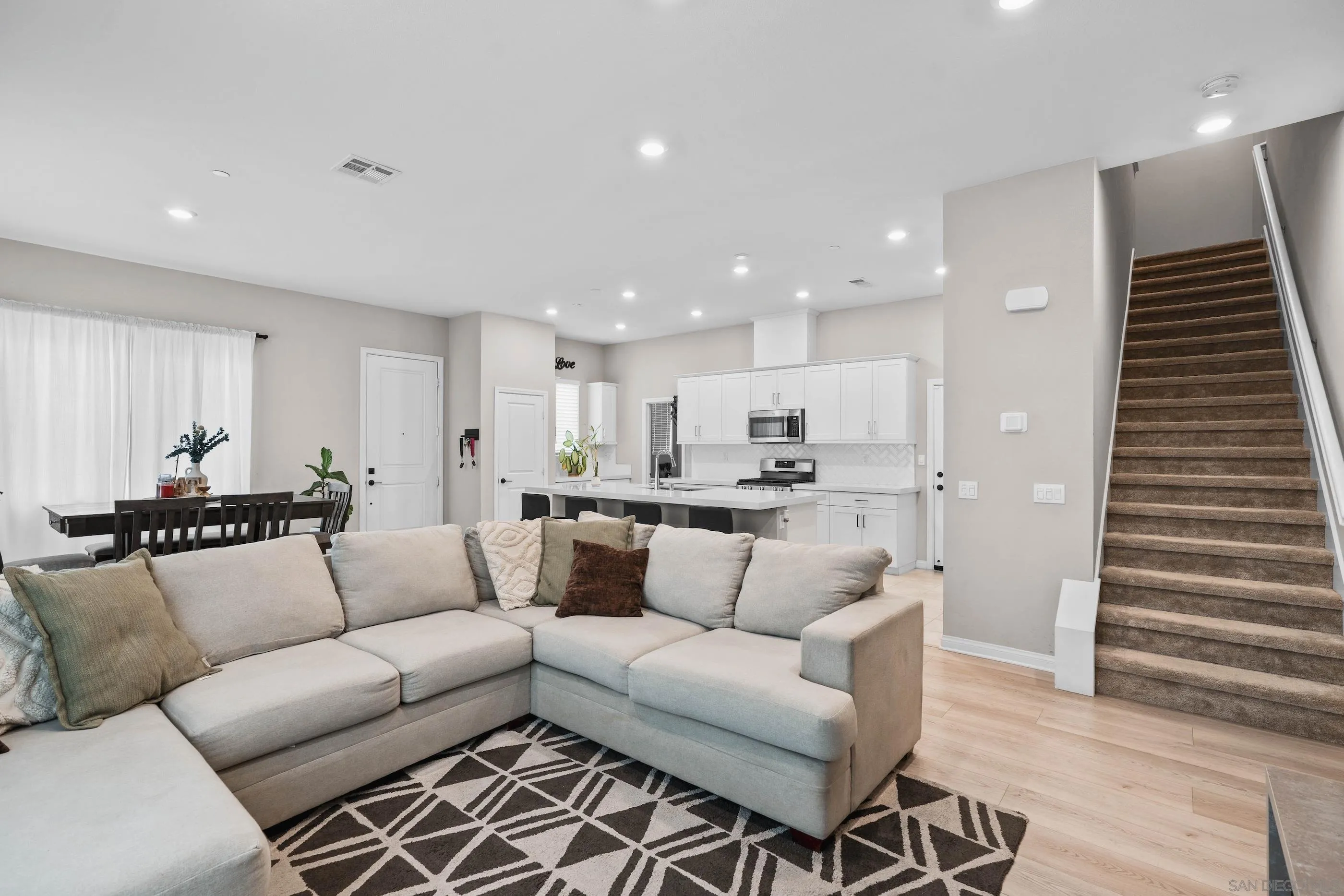 2098 Bluestone Circle Chula Vista, CA 91913 - Photo 11 of 25 a living room with furniture and wooden floor