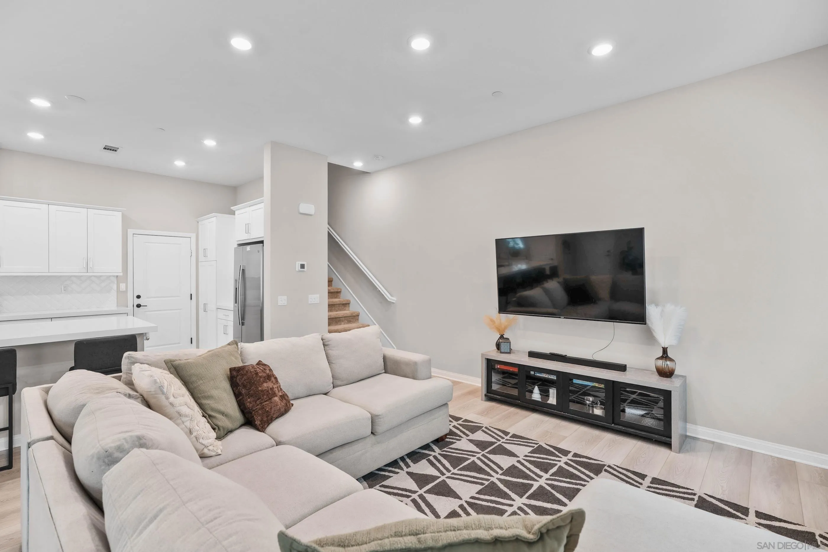 2098 Bluestone Circle Chula Vista, CA 91913 - Photo 10 of 25 a living room with furniture and a flat screen tv