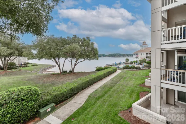 a view of a garden with a house