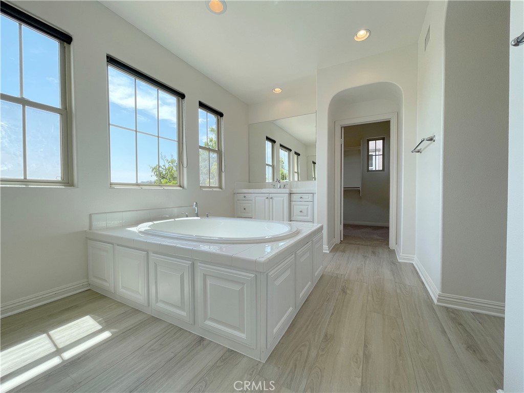 40 Paseo Lerida San Clemente, CA 92673 - Photo 32 of 55 a bathroom with a granite countertop sink and a mirror
