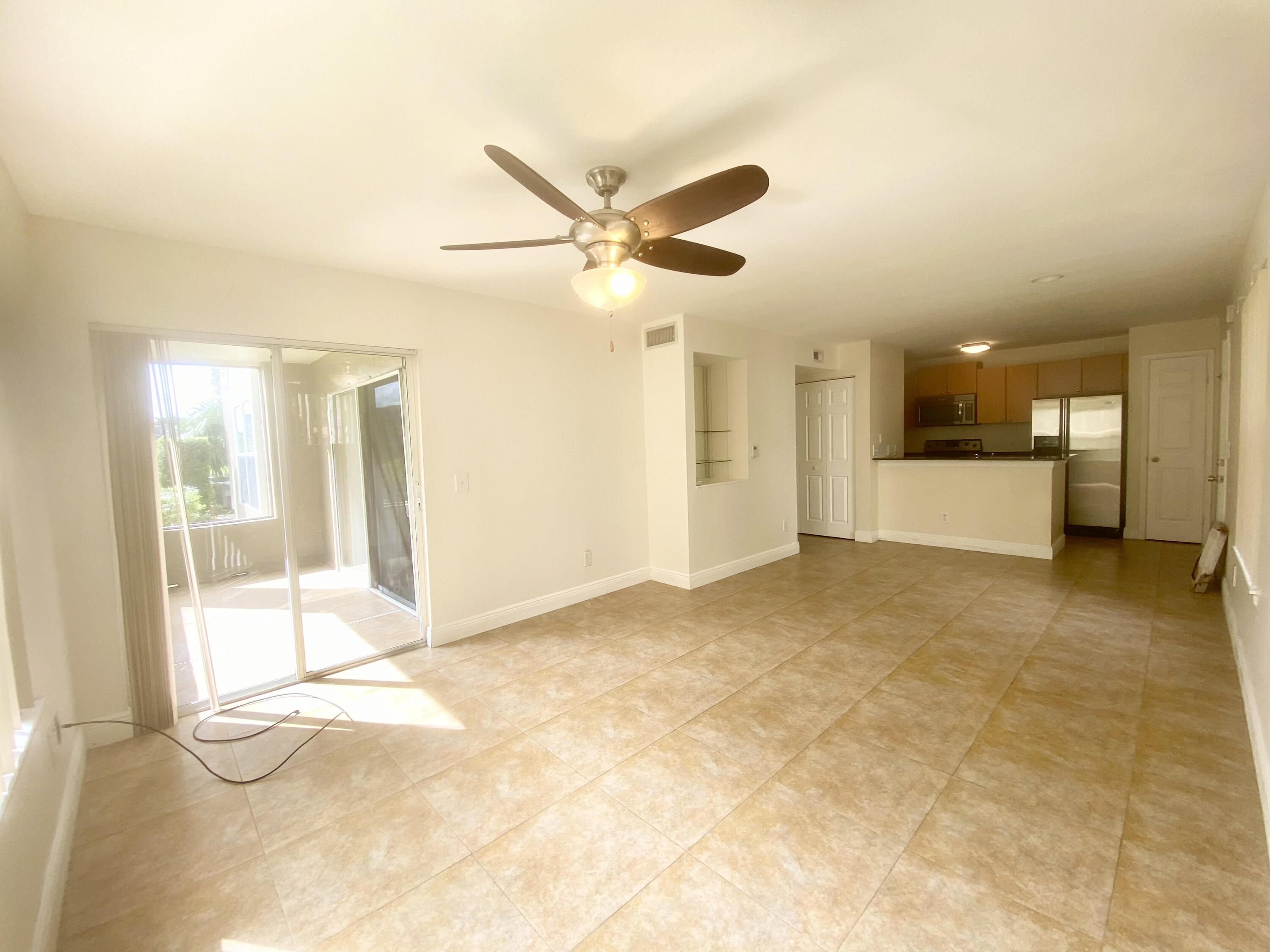 1745 Palm Cove Boulevard, Unit 3101 Delray Beach, FL 33445 - Photo 13 of 33 a view of a livingroom with a staircase