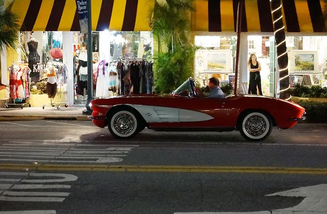 a car parked in front of a building