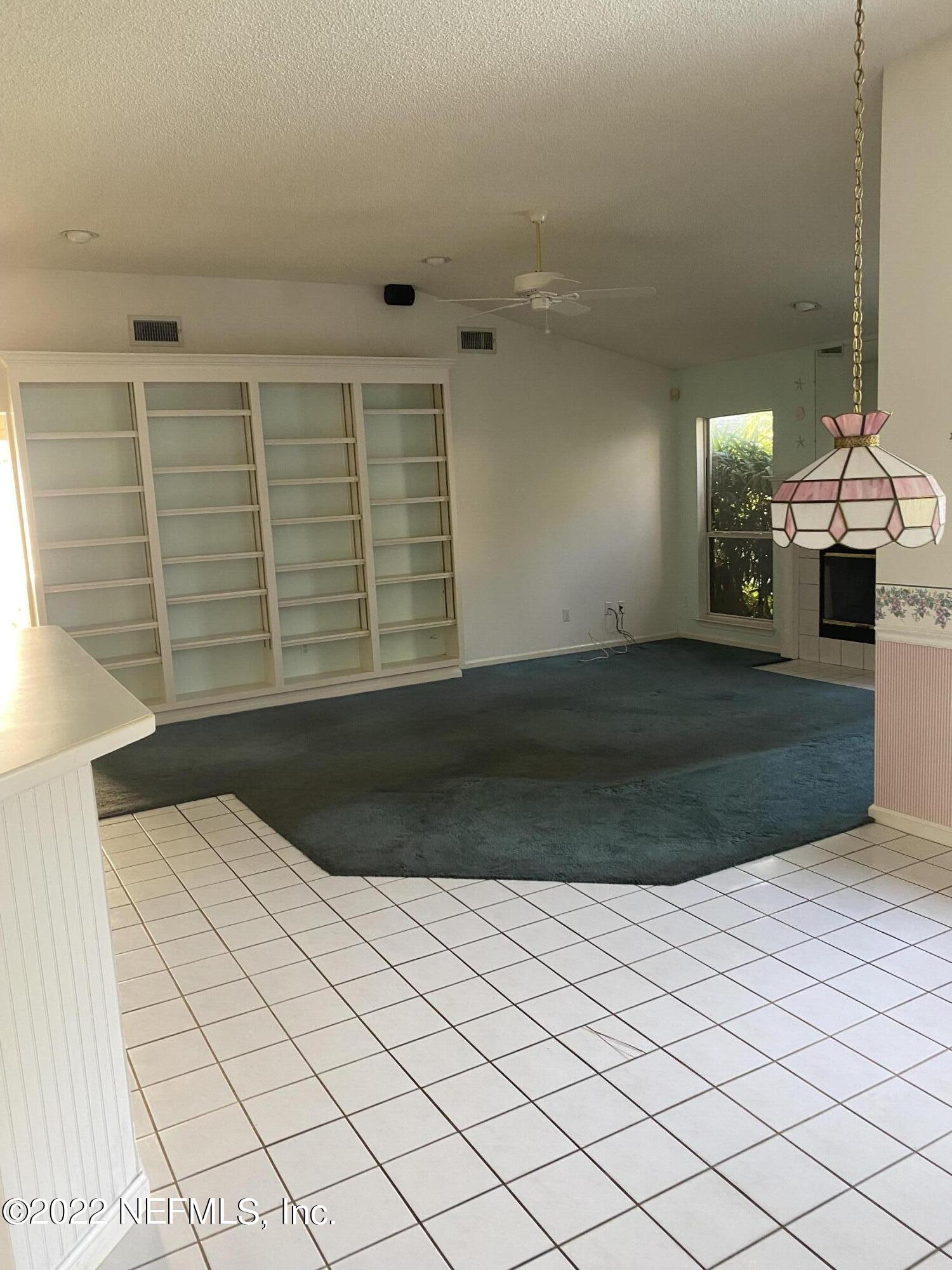 627 Cherry Street Neptune Beach, FL 32266 - Photo 4 of 17 a view of a living room and a window
