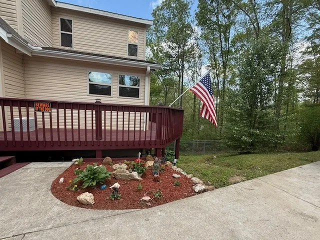 a view of a chairs on the roof deck