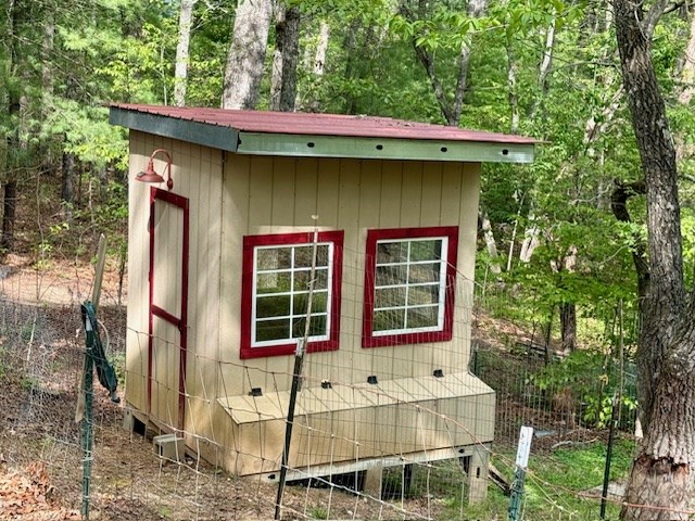 329 Tommy's Lane Murphy, NC 28906 - Photo 60 of 77 a front view of a house with a garden