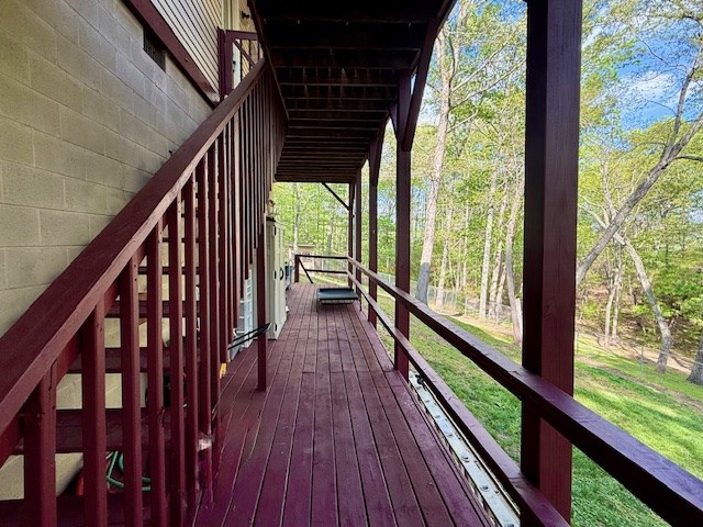329 Tommy's Lane Murphy, NC 28906 - Photo 8 of 77 a view of balcony with wooden floor and iron stairs