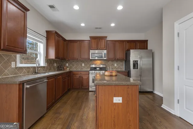 a bathroom with a sink and toilet