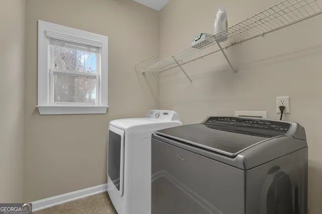 a bathroom with a bathtub and a sink