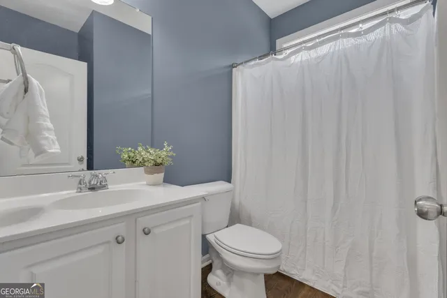 a view of a room with racks on the wall