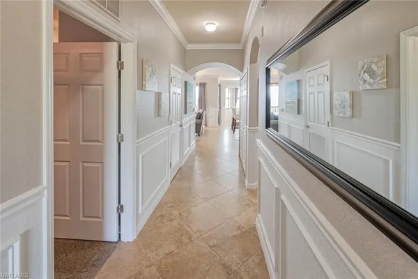 a view of a hallway with windows